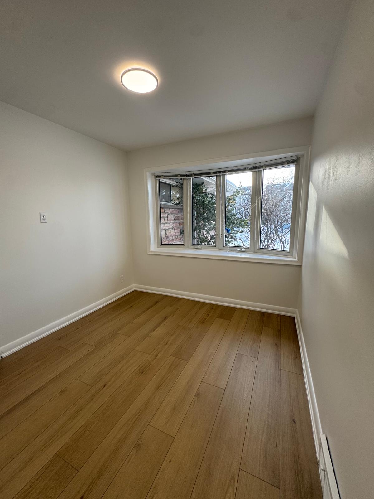 Hardwood floor installation in Scarborough bedroom