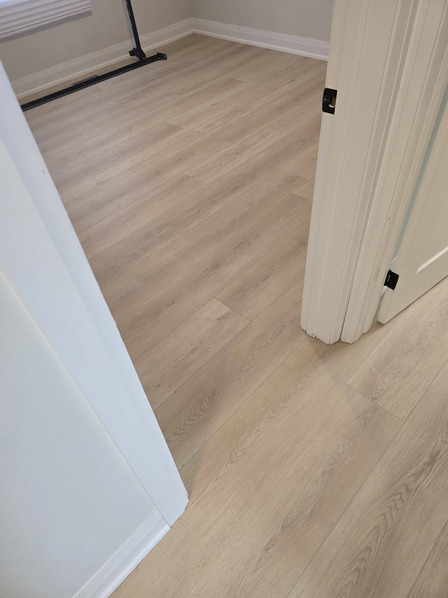 Light oak vinyl plank flooring in Mississauga bedroom