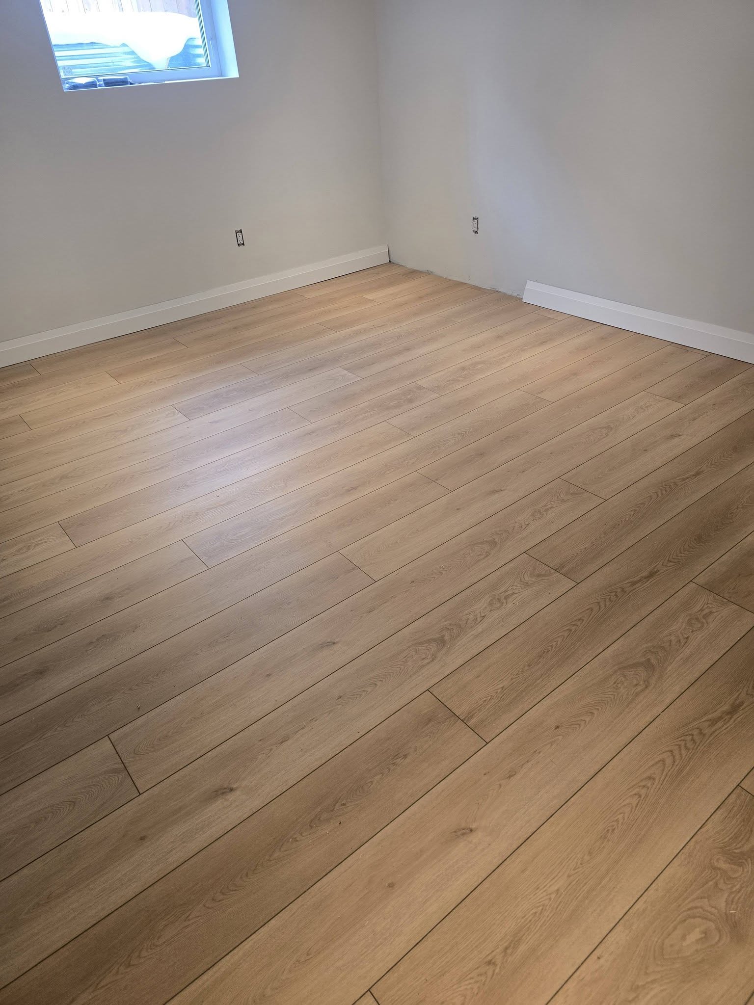 Natural oak vinyl plank flooring — Brampton home