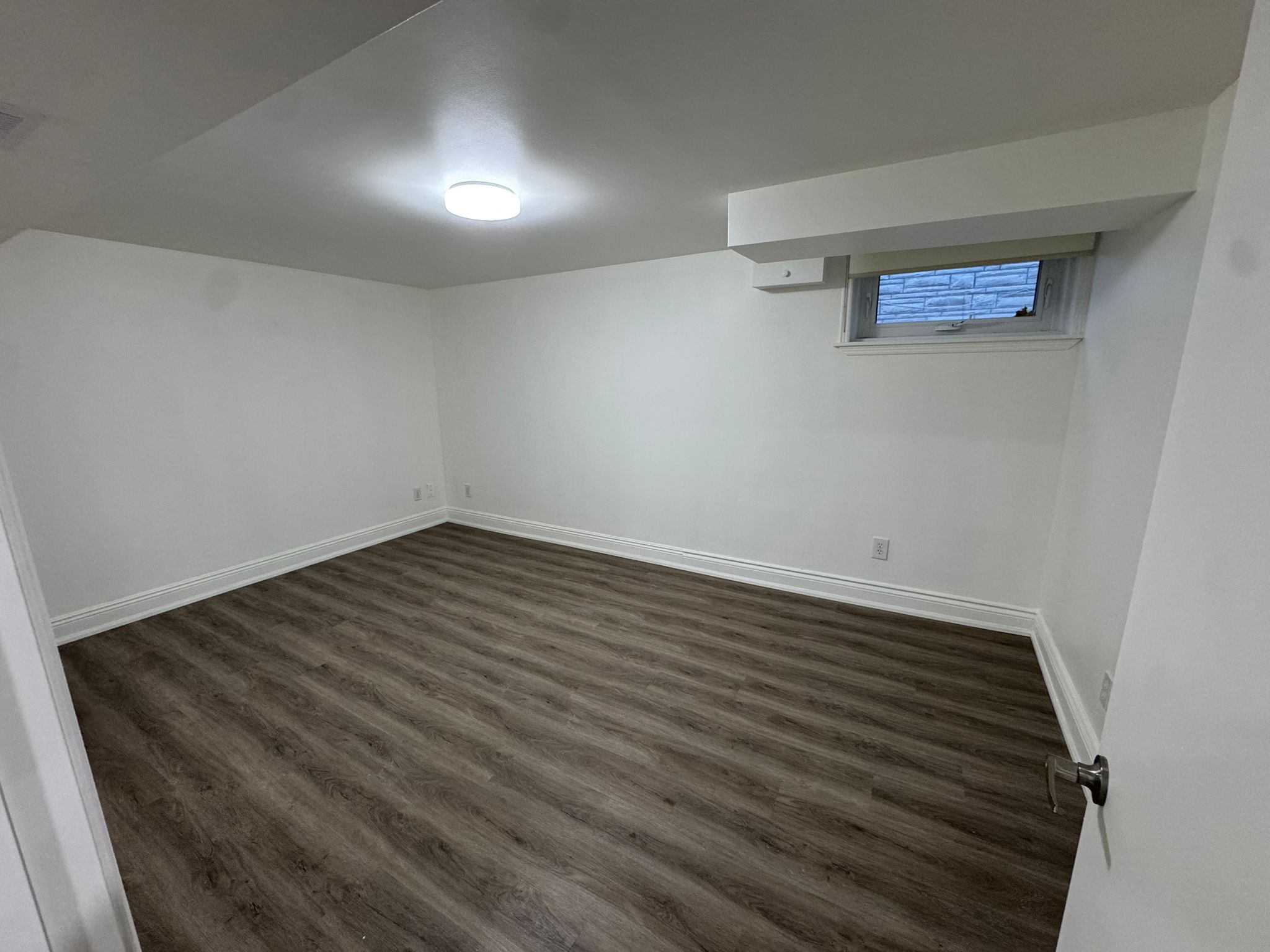 Vinyl plank flooring installed in Toronto basement